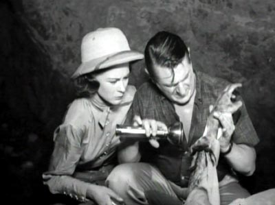 Sally et son père découvrent le dorps sans vie de Dan - Le cerveau de la planète Arous (The Brain from Planet Arous)